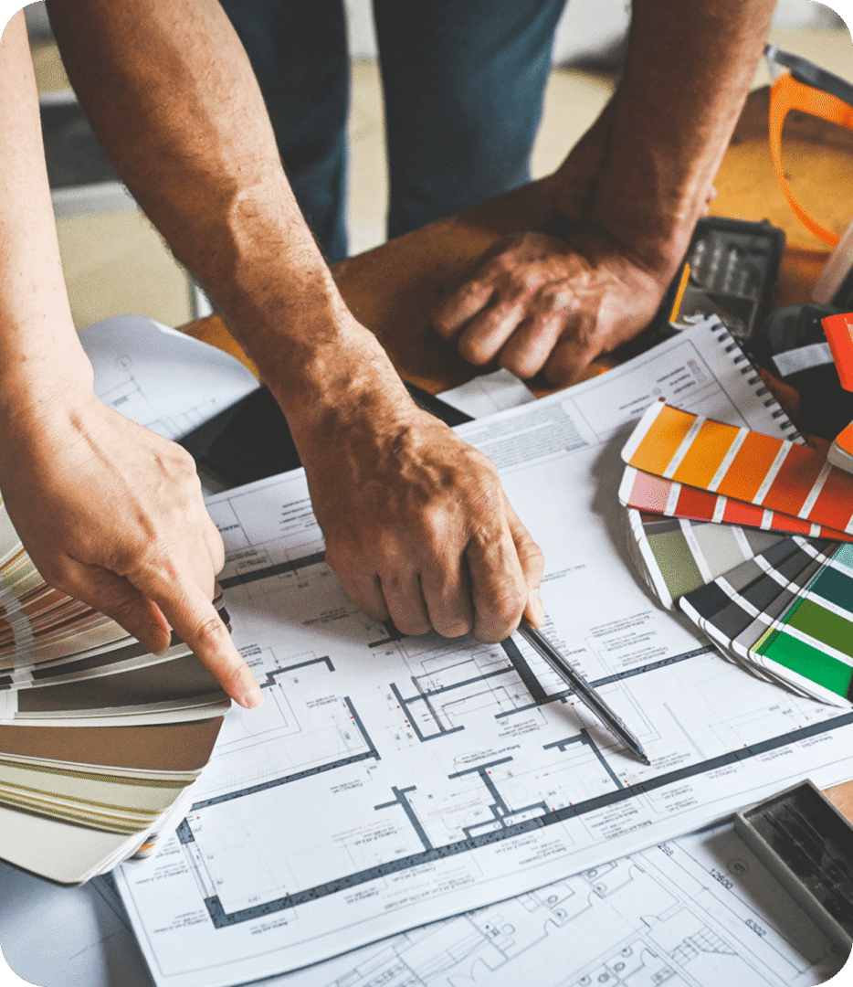 Team reviewing architectural plans and palettes