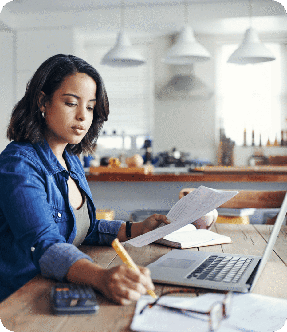 Woman working at home with laptop
