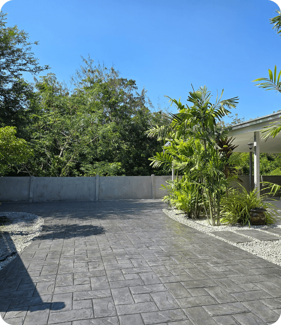 Paved path beside modern house